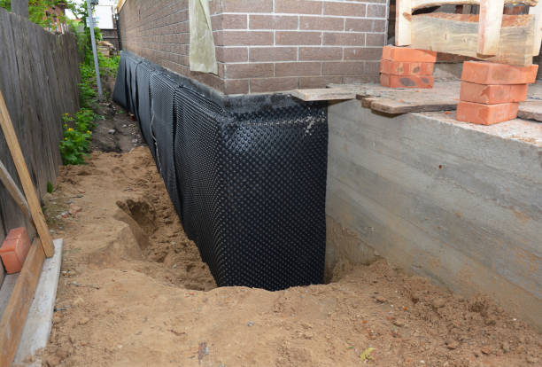 SJ Waterproofing Pros technician performing targeted Waterproofing assessment in Oakwood, PA